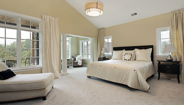 bright and airy bedroom with carpet